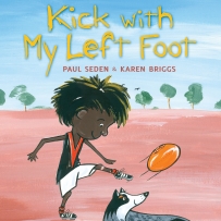 Kick with My Left Foot book cover featuring a boy kicking an Australian foot ball next to a dog.