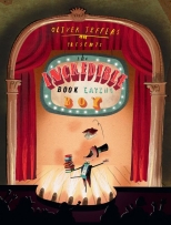 The Incredible Book Eating Boy book cover featuring a boy standing on a stage eating books.