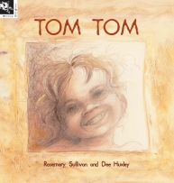 Tom Tom book cover featuring the face of a child smiling.