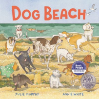 The book cover shows a dog beach scene with many different types of dogs enjoying the sand and water. The title “Dog Beach” is written in bold red font.