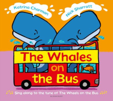 The cover is brightly coloured with two whales riding in a red double‑decker bus that is being driven by a goldfish. The title “The Whales on the Bus” is written on the side of the bus.