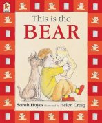 This Is the Bear book cover featuring a boy holding a bear next to a dog. 